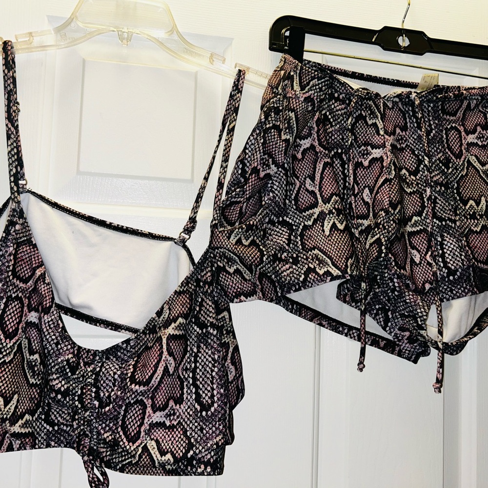 Two piece plus size swimsuit. Purple animal print